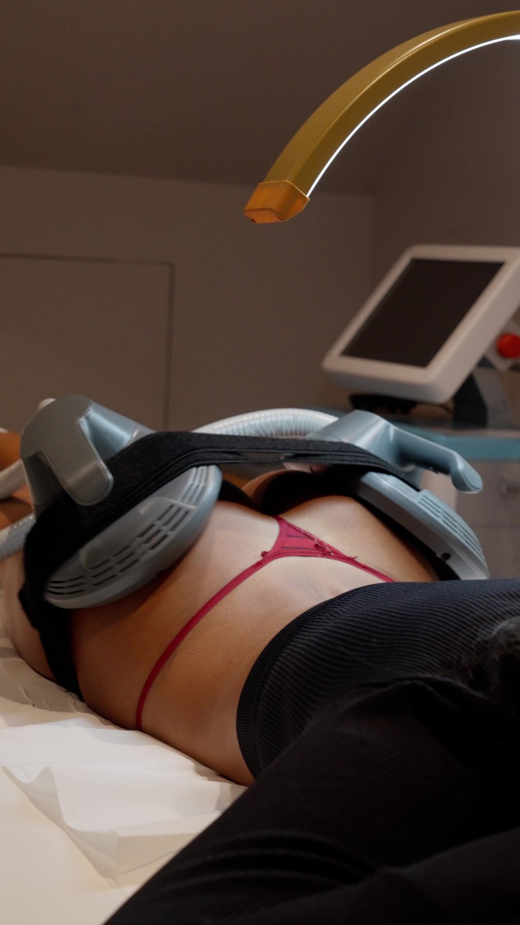 An EMS and RF Body Sculpt session underway in a treatment room at Waldor Clinic