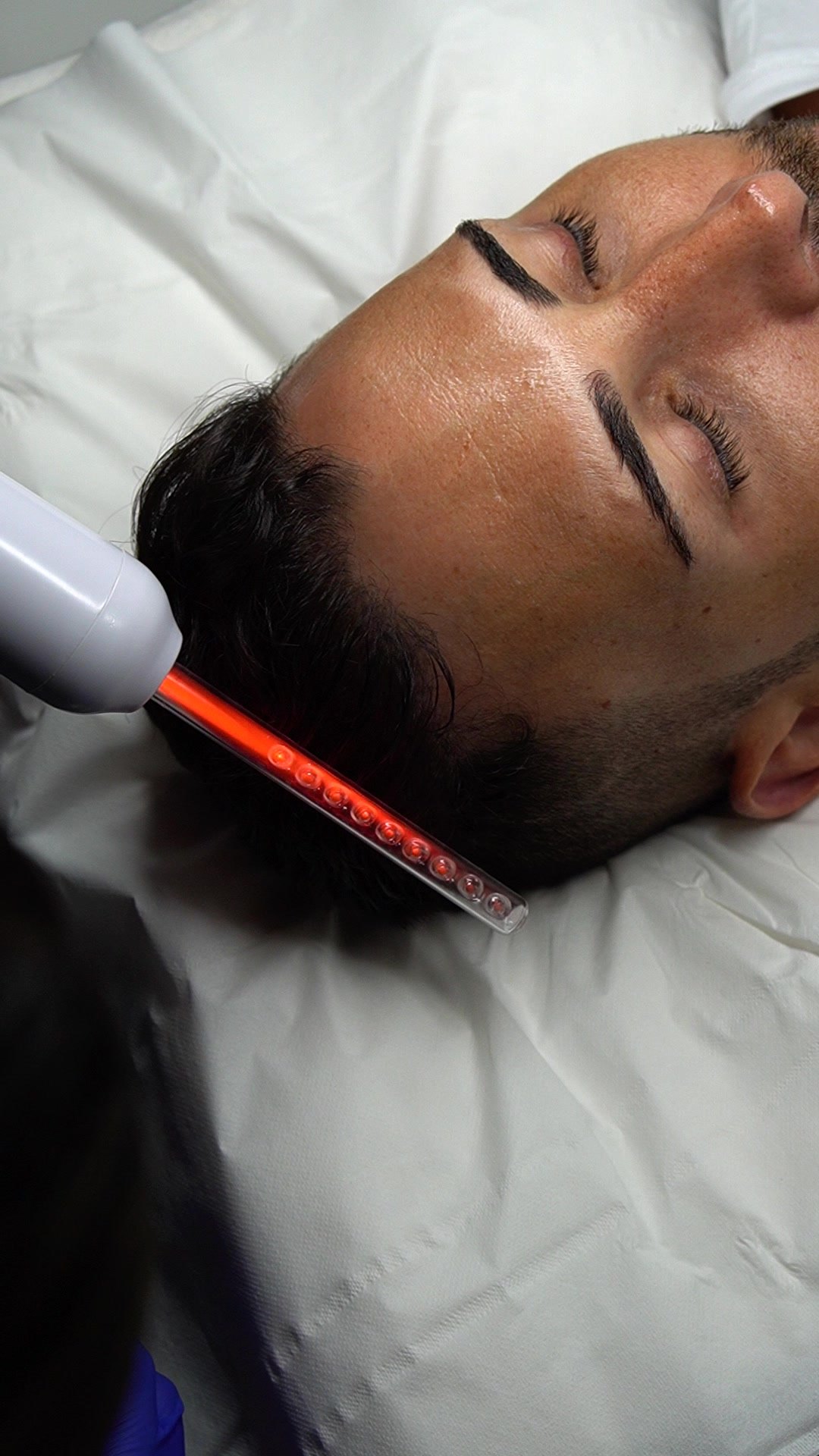A hair treatment session underway in a treatment room at Waldor Clinic, London